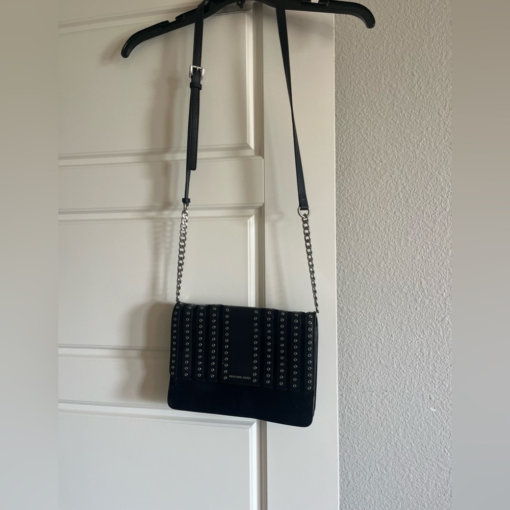 MICHAEL KORS crossbody purse. Black and silver. SUPER ROOMY. 3 sections inside
